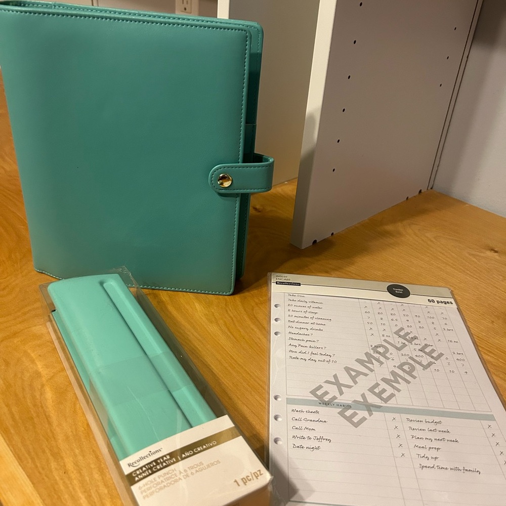 Planner, binder, hole puncher and pages! Customizable to create your own year!